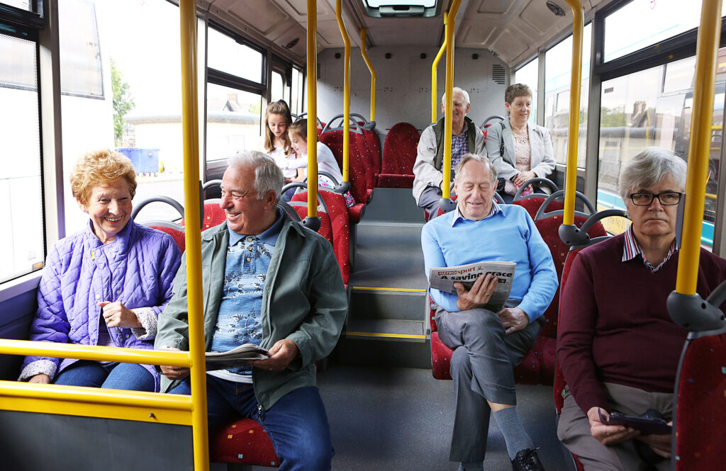 Elderly people ride the bus